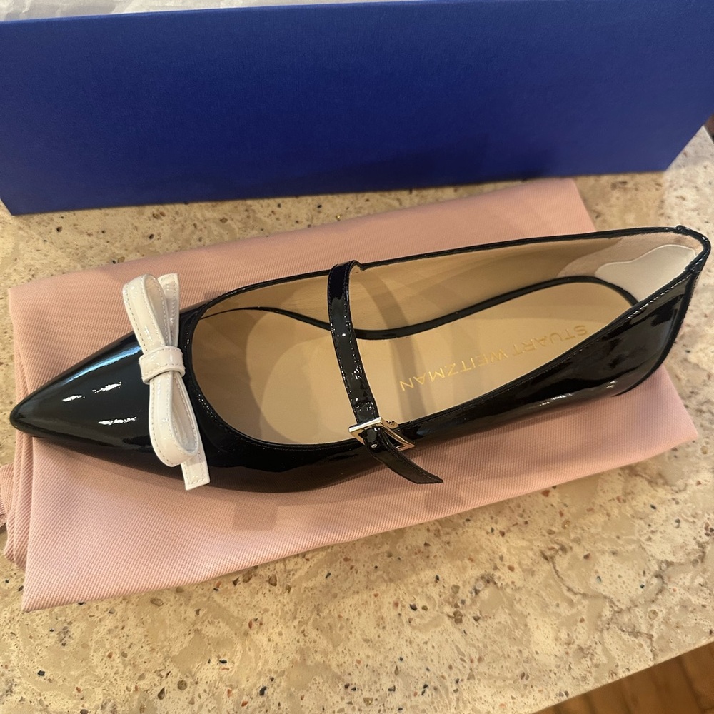 Stuart Weitzman Black Patent Leather Flat with White Bow